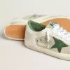 Super-Star LTD da uomo in pelle scamosciata bianca e mesh con stella in pelle verde e linguetta posteriore argentata Super-Star LTD da uomo in pelle scamosciata bianca e mesh con stella in pelle verde e linguetta posteriore argentata