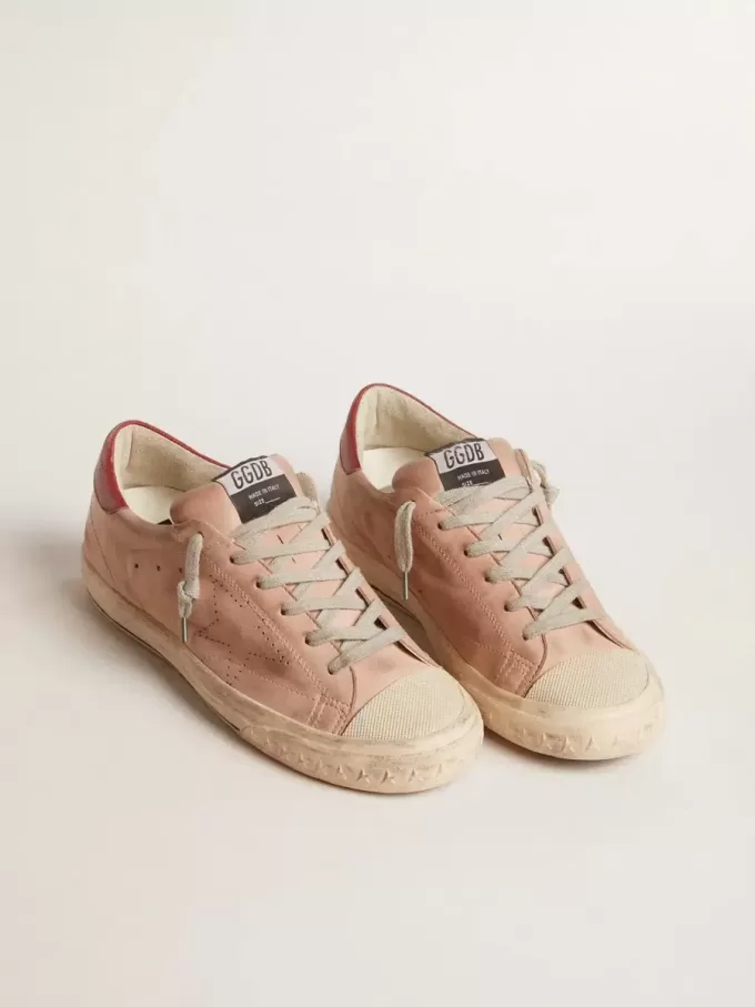 Super-Star LTD in nabuk rosa con stella traforata e linguetta in pelle sul tallone