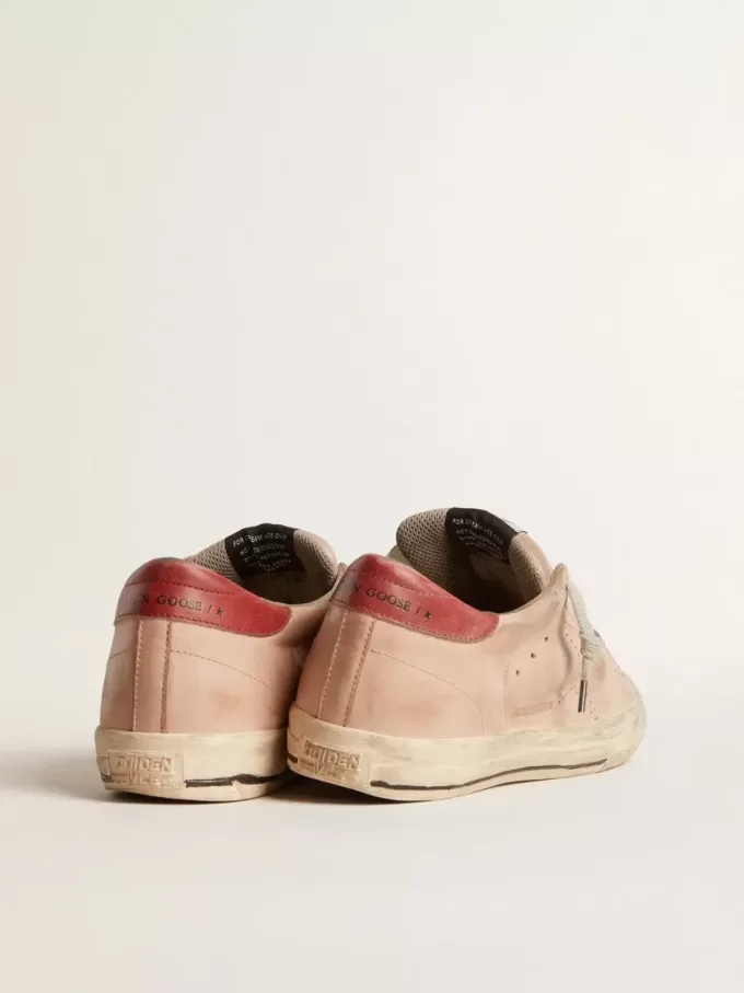 Super-Star LTD in nabuk rosa con stella traforata e linguetta in pelle sul tallone