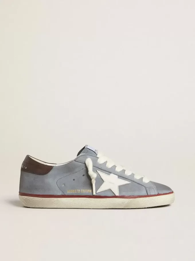 Super-Star LTD in pelle nabuk azzurra con stella in pelle bianca e linguetta sul tallone in pelle marrone Super-Star LTD in pelle nabuk azzurra con stella in pelle bianca e linguetta sul tallone in pelle marrone