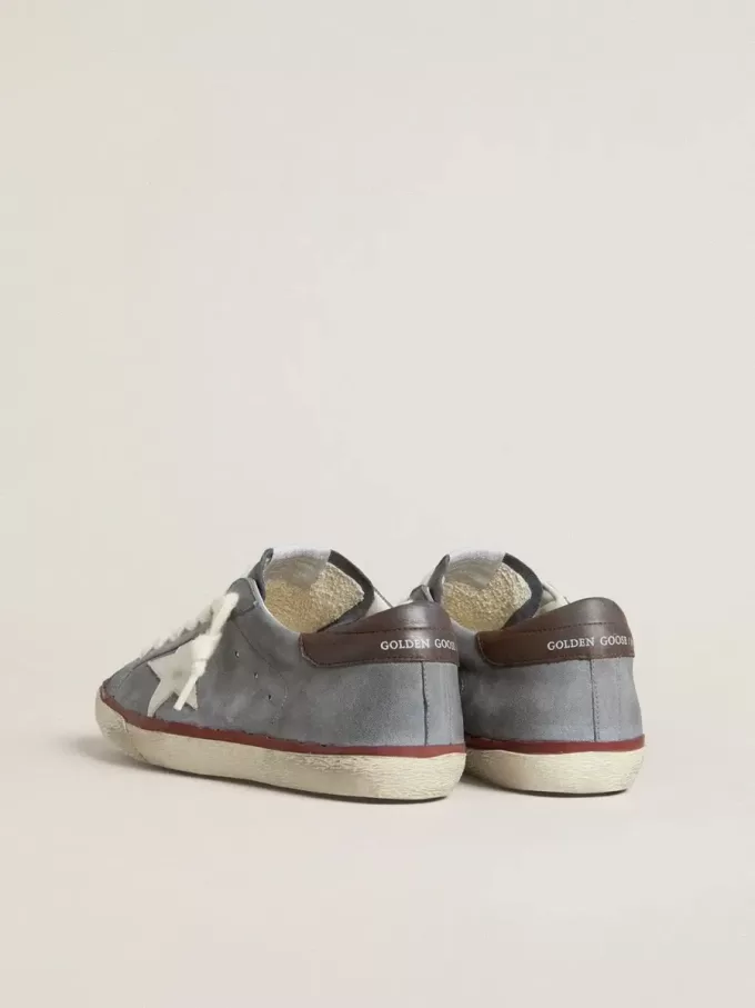 Super-Star LTD in pelle nabuk azzurra con stella in pelle bianca e linguetta sul tallone in pelle marrone Super-Star LTD in pelle nabuk azzurra con stella in pelle bianca e linguetta sul tallone in pelle marrone