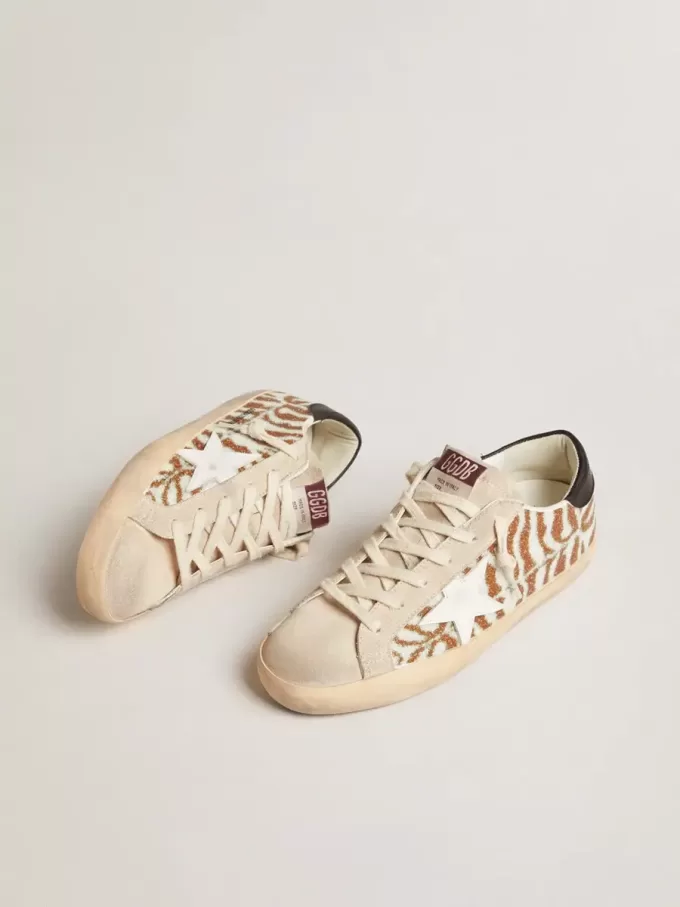 Super-Star LTD in Swarovski effetto zebrato con stella in pelle bianca