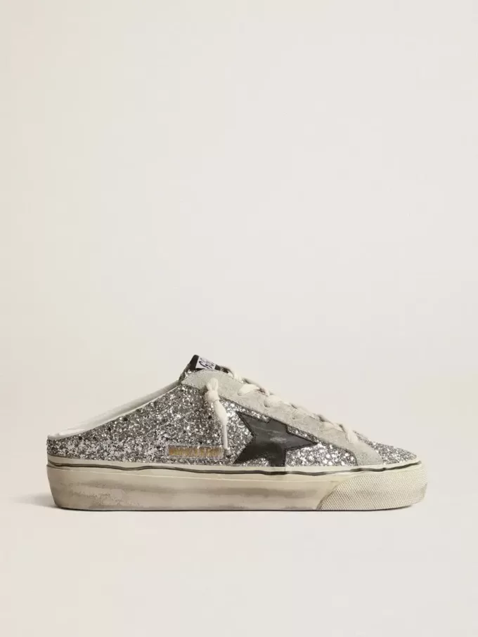 Super-Star Sabot da donna in glitter argento con stella in pelle nera Super-Star Sabot da donna in glitter argento con stella in pelle nera