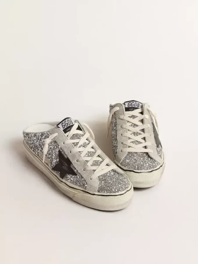 Super-Star Sabot da donna in glitter argento con stella in pelle nera Super-Star Sabot da donna in glitter argento con stella in pelle nera