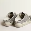 Super-Star Sabot da donna in glitter argento con stella in pelle nera Super-Star Sabot da donna in glitter argento con stella in pelle nera