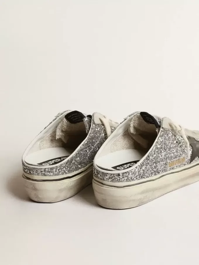 Super-Star Sabot da donna in glitter argento con stella in pelle nera Super-Star Sabot da donna in glitter argento con stella in pelle nera