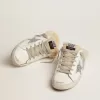 Super-Star Sabot da donna in pelle bianca e fodera in shearling Super-Star Sabot da donna in pelle bianca e fodera in shearling