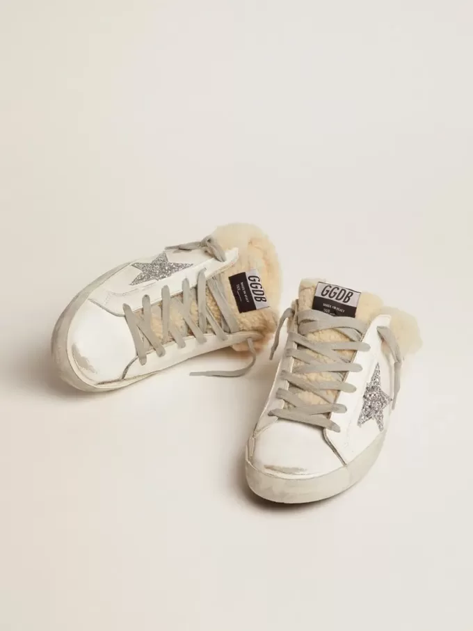 Super-Star Sabot da donna in pelle bianca e fodera in shearling Super-Star Sabot da donna in pelle bianca e fodera in shearling