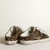 Super-Star Sabot da donna in pelle di cavallino con stampa leopardata e stella nera Super-Star Sabot da donna in pelle di cavallino con stampa leopardata e stella nera