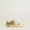 Super-Star Young in glitter dorato con stella e linguetta sul tallone in pelle bianca Super-Star Young in glitter dorato con stella e linguetta sul tallone in pelle bianca