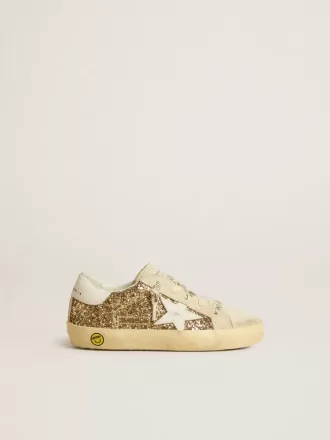 Super-Star Young in glitter dorato con stella e linguetta sul tallone in pelle bianca