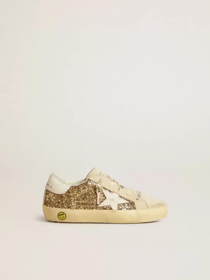 Super-Star Young in glitter dorato con stella e linguetta sul tallone in pelle bianca Super-Star Young in glitter dorato con stella e linguetta sul tallone in pelle bianca