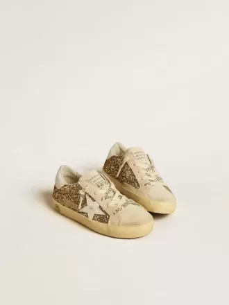 Super-Star Young in glitter dorato con stella e linguetta sul tallone in pelle bianca