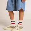 Super-Star Young in glitter dorato con stella e linguetta sul tallone in pelle bianca Super-Star Young in glitter dorato con stella e linguetta sul tallone in pelle bianca