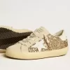 Super-Star Young in glitter dorato con stella e linguetta sul tallone in pelle bianca Super-Star Young in glitter dorato con stella e linguetta sul tallone in pelle bianca