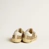 Super-Star Young in glitter dorato con stella e linguetta sul tallone in pelle bianca Super-Star Young in glitter dorato con stella e linguetta sul tallone in pelle bianca