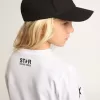 T-shirt bianca a maniche lunghe con stelle nere a contrasto