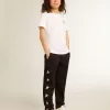 T-shirt bianca con logo argentato a contrasto sul davanti