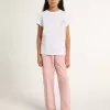 T-shirt bianca da bambina con logo rosa glitterato e maxi stella T-shirt bianca da bambina con logo rosa glitterato e maxi stella