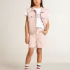 T-shirt bianca da bambina con scritte dorate glitterate rosa
