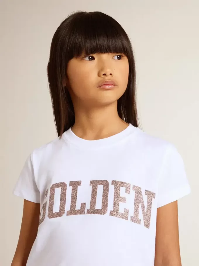 T-shirt bianca da bambina con scritte dorate glitterate rosa