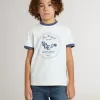 T-shirt bianca da bambino con stampa blu T-shirt bianca da bambino con stampa blu