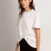 T-shirt bianca da donna con cristalli cabochon T-shirt bianca da donna con cristalli cabochon