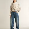T-shirt bianca da donna con stampa floreale T-shirt bianca da donna con stampa floreale