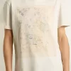 T-shirt bianca da donna con stampa floreale T-shirt bianca da donna con stampa floreale