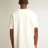 T-shirt bianca da uomo con trattamento effetto consumato T-shirt bianca da uomo con trattamento effetto consumato