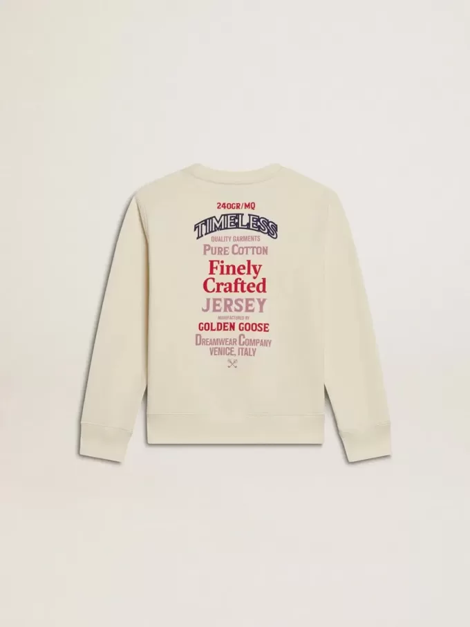 T-shirt da bambina in bianco consumato con ricamo sul davanti e stampa sul retro