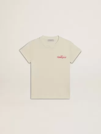 T-shirt da bambina in cotone bianco consumato con ricamo rosso sul petto