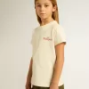 T-shirt da bambina in cotone bianco consumato con ricamo rosso sul petto