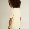 T-shirt da bambino in bianco consumato con scritte multicolori