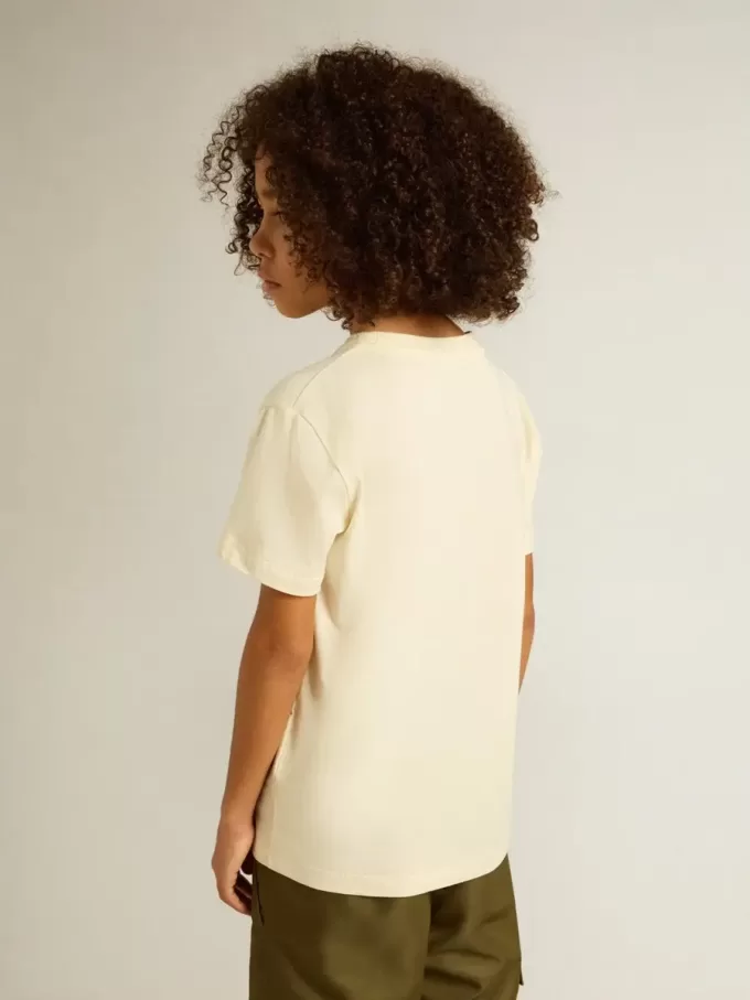 T-shirt da bambino in bianco consumato con scritte multicolori
