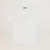 T-shirt da donna bianca con logo glitterato argento e stella T-shirt da donna bianca con logo glitterato argento e stella