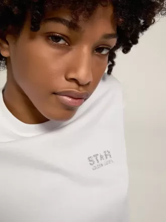 T-shirt da donna bianca con logo glitterato argento e stella