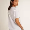 T-shirt da donna bianca con stella blu scuro sul davanti