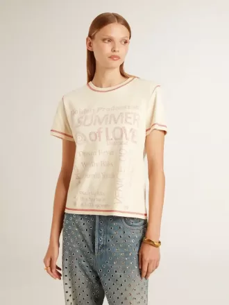 T-shirt da donna color crema con dettagli rosso slavato