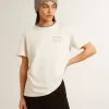 T-shirt da donna in cotone bianco invecchiato con ricami fatti a mano