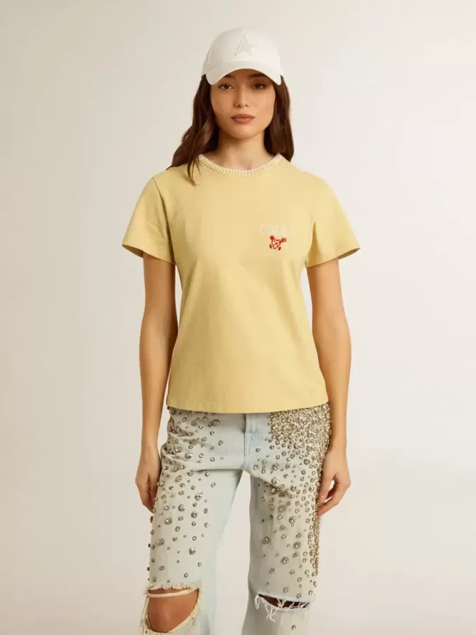 T-shirt da donna in jersey di cotone con ricamo sul collo e sul cuore T-shirt da donna in jersey di cotone con ricamo sul collo e sul cuore