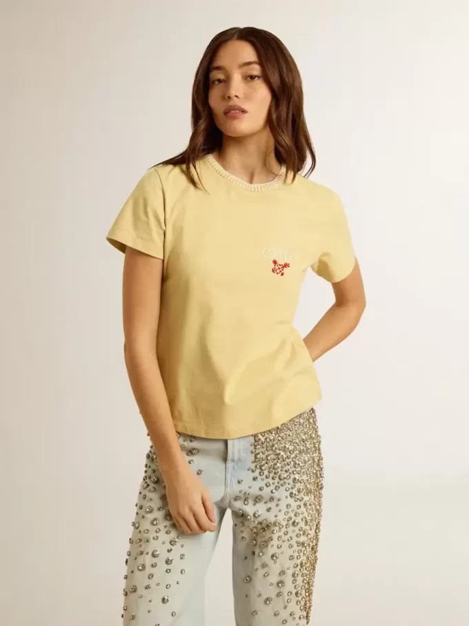 T-shirt da donna in jersey di cotone con ricamo sul collo e sul cuore T-shirt da donna in jersey di cotone con ricamo sul collo e sul cuore