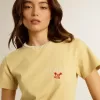 T-shirt da donna in jersey di cotone con ricamo sul collo e sul cuore T-shirt da donna in jersey di cotone con ricamo sul collo e sul cuore
