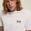 T-shirt della collezione White Star con logo nero a contrasto e stella T-shirt della collezione White Star con logo nero a contrasto e stella