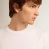 T-shirt della collezione White Star con stella nera sul davanti T-shirt della collezione White Star con stella nera sul davanti