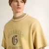 T-shirt oversize da uomo in cotone giallo con stampa blu