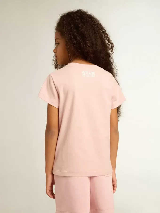 T-shirt rosa da bambina con logo bianco e maxi stella T-shirt rosa da bambina con logo bianco e maxi stella
