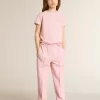 T-shirt rosa da bambina con logo glitterato argento e maxi stella T-shirt rosa da bambina con logo glitterato argento e maxi stella