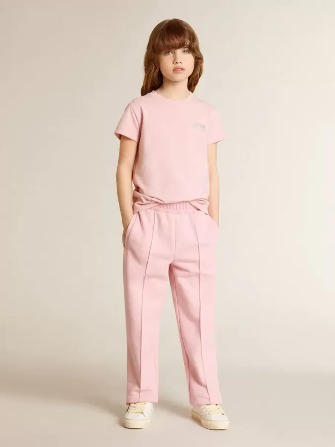 T-shirt rosa da bambina con logo glitterato argento e maxi stella T-shirt rosa da bambina con logo glitterato argento e maxi stella
