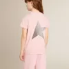 T-shirt rosa da bambina con logo glitterato argento e maxi stella T-shirt rosa da bambina con logo glitterato argento e maxi stella